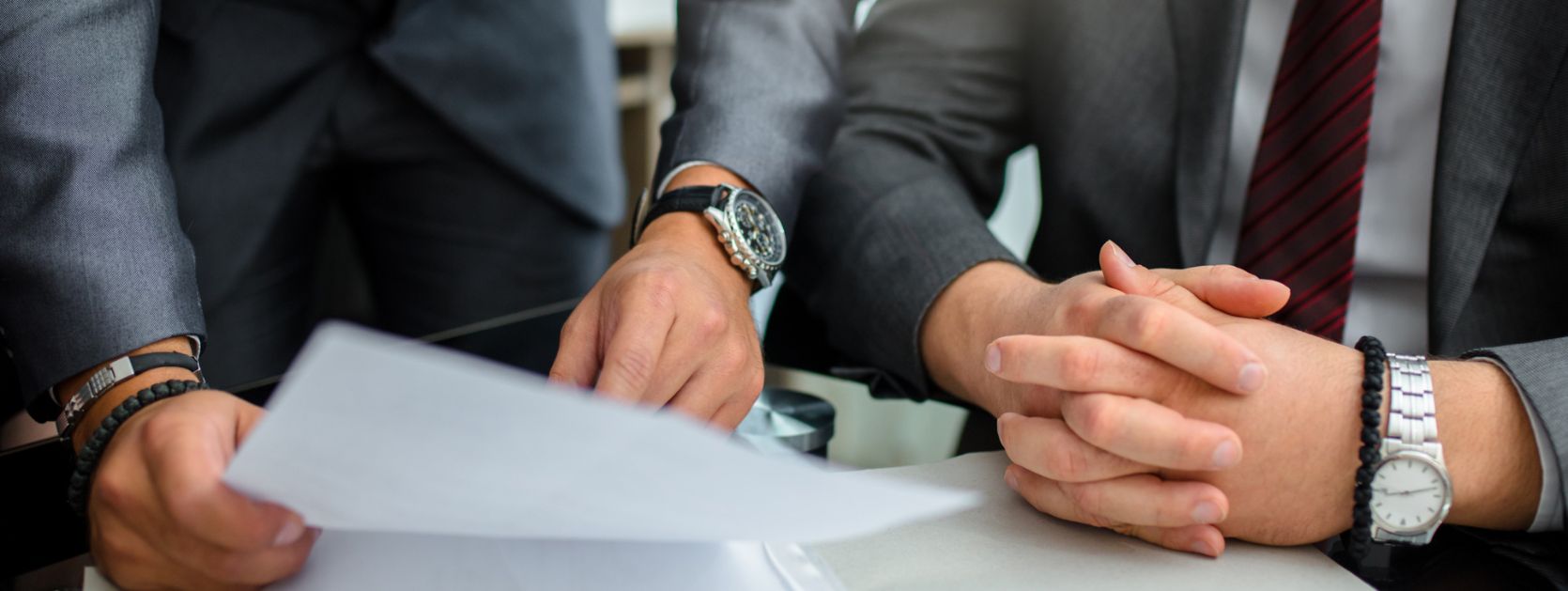 Inspecting construction plans Inspecting construction plans, viewed from above.