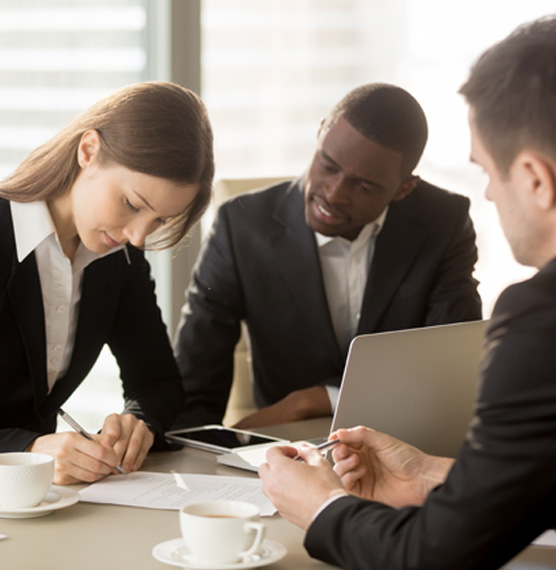 signing papers in meeting
